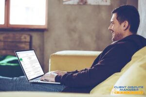 Beginner using credit repair software on laptop at home, reviewing credit report and disputes with Client Dispute Manager Software in 2026
