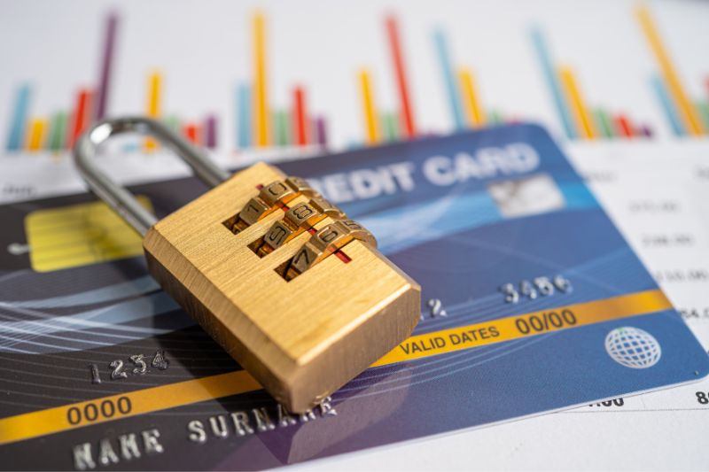 Credit card with lock representing data security and privacy standards for credit repair companies including FTC Safeguards Rule and protection of consumer information
