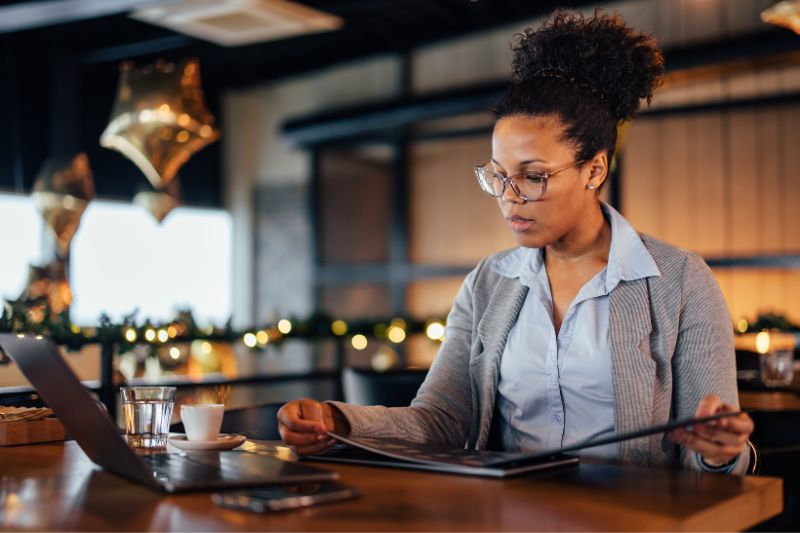 Businesswoman reviewing credit repair contract showing legal requirements for credit repair organizations including CROA compliance, written agreements, disclosures, and consumer rights