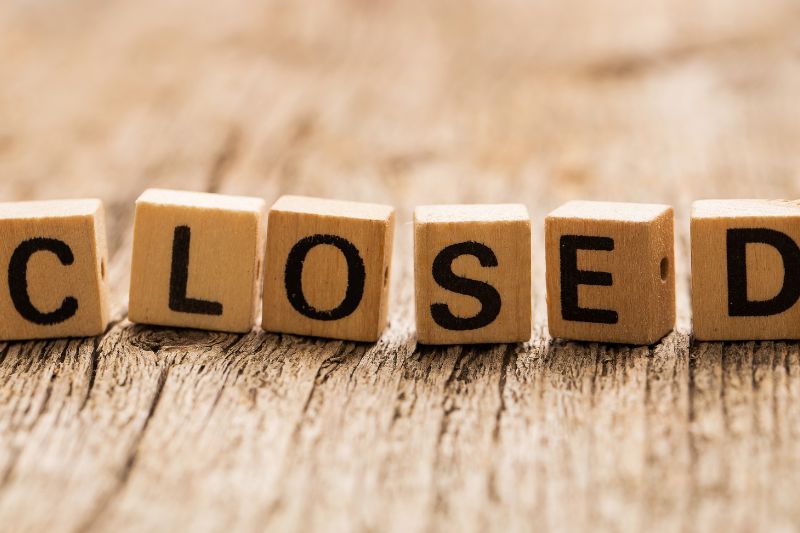 Closed sign spelled with wooden blocks representing a dispute closed account credit report rejection and why a closed account credit report dispute may be denied under FCRA credit report dispute rights