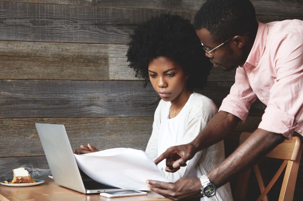 Credit repair professionals reviewing dispute documents and supporting evidence during the FCRA dispute process
