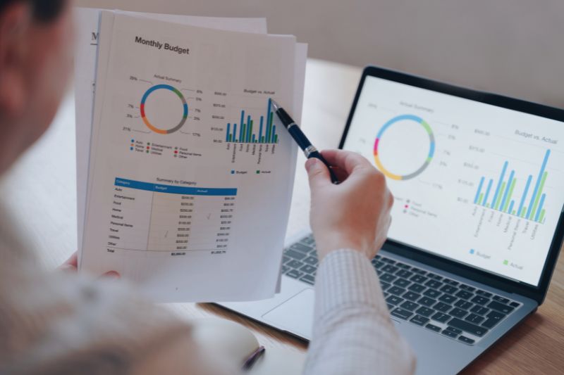 Credit report analytics software comparing report data, account details, and visual charts for review